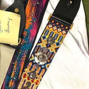 Dior studded guitar strap.  37”